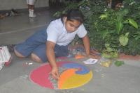 Rangoli being made by Satyans  for the Rangoli Competition