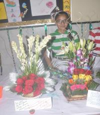 Satyans displaying their talent through Flower arrangement